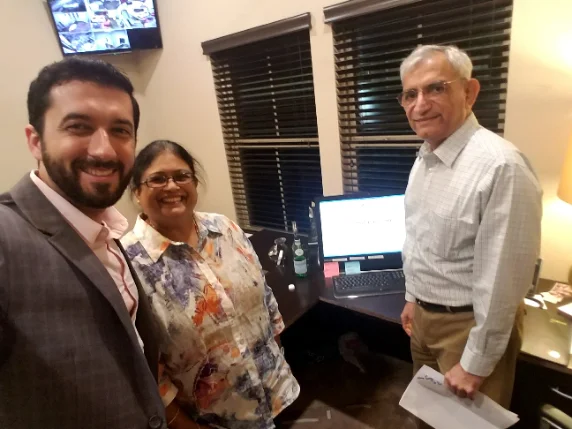 Cory Elliott Burke with Ram and his wife on closing day